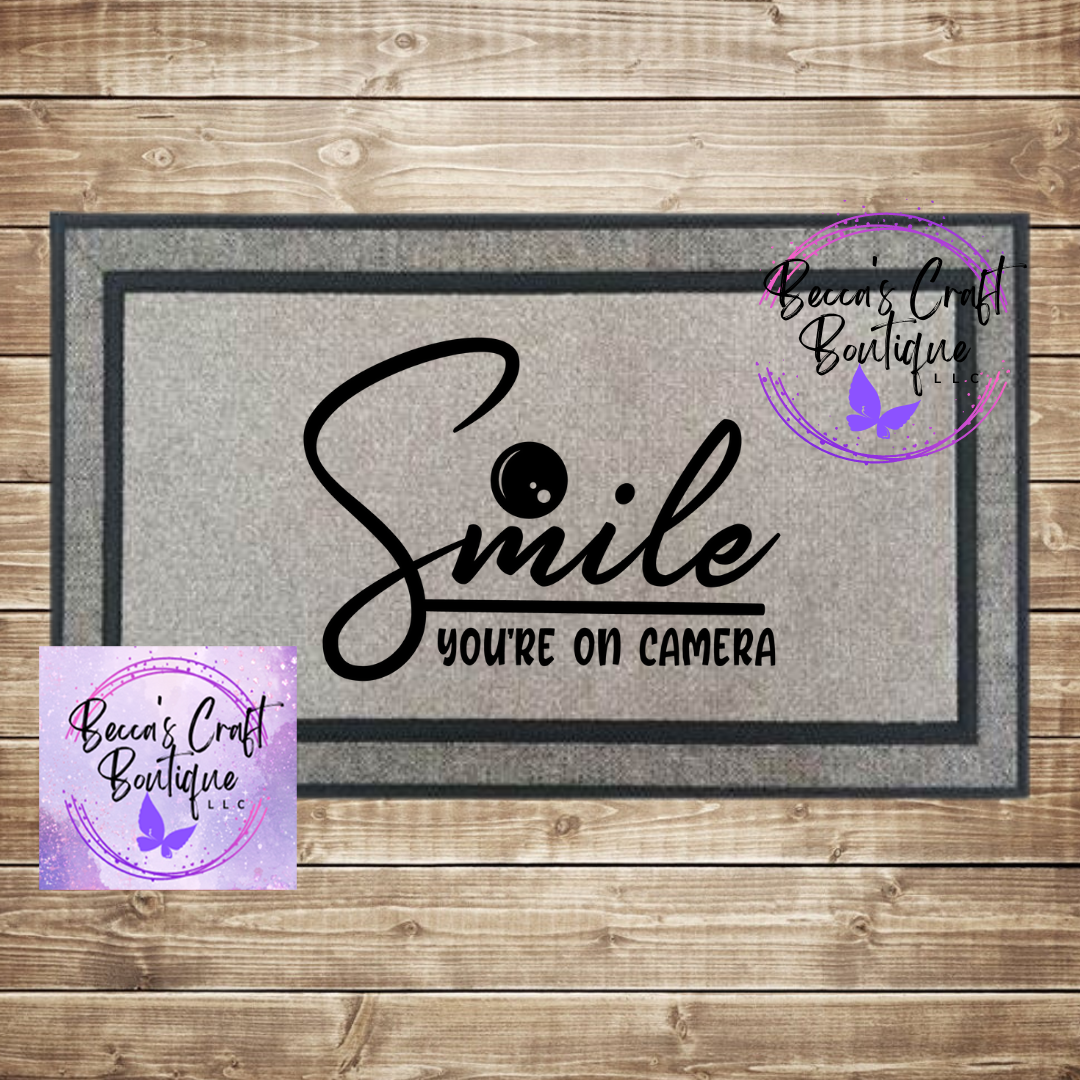 Smile you're on camera doormat